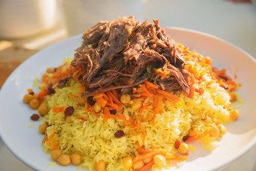 pilaf and other dishes in the cauldron. Methods and ingredients for cooking pilaf. Lamb and beef in Eastern cuisine