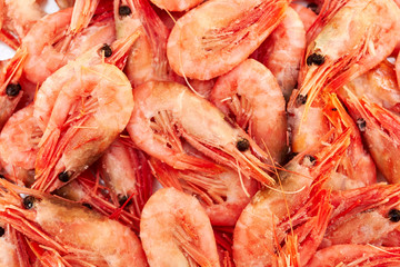 Shrimp. Shrimps lie on a plate. Boiled ready-to-eat shrimp. A large dish of small shrimps.