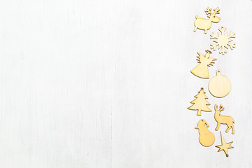 Christmas wooden ornaments on white background.