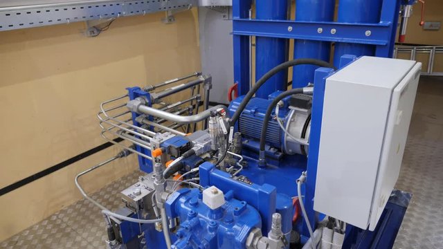 Hydroelectric power station. hydro power plant. Rexrohx pump. Pumping station. Sustainable electricity production using renewable river resources. Shooting inside the hydraulic room. camera in motion.
