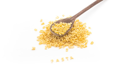 Pile of Letter-shaped pasta in a wooden spoon