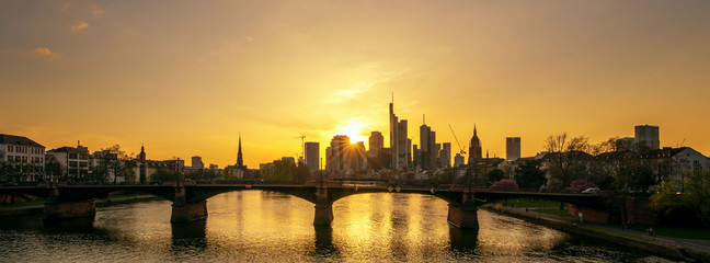 The skyline of the banking metropolis in Frankfurt am Main during a beautiful sunset. Concept:...