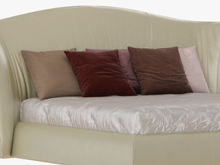 Large beige bed with a soft back and colored pillows 3D rendering