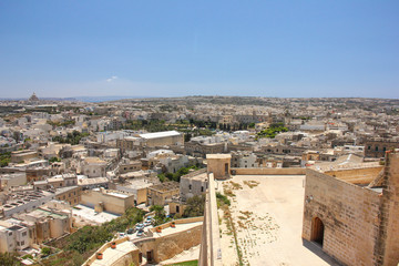 Obraz premium Panoramic view of narrow street in old town Rabat, now called Victoria on Gozo island, Malta