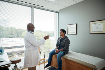 Doctor talks with patient