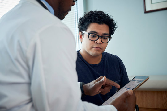 Doctor speaking with patient