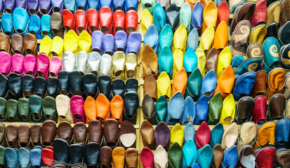 Fototapeta na wymiar Marrakesh, Morocco, 14th October 2017. Display of brightly coloured slippers.