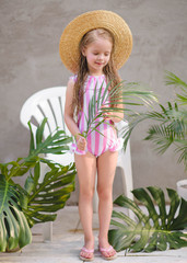 portrait of little girl outdoors in summer