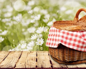 Picnic Basket with napkin on nature background