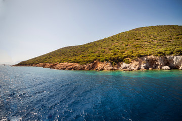 Turquoise water near beach on Aegean coast  sea Turkish resort, Bodrum, Turkey