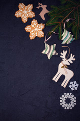 Christmas and New Year border or frame on black background. Winter holidays concept. Greeting template. Top view, toned