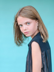 Fototapeta premium portrait of little girl outdoors in summer