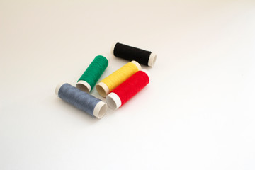 Coils of thread in the shape of the flag of Germany