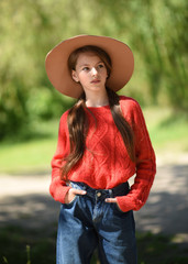 portrait of little girl outdoors in summer