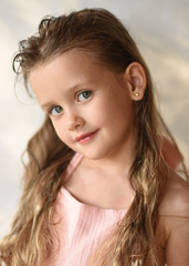 portrait of little girl outdoors in summer