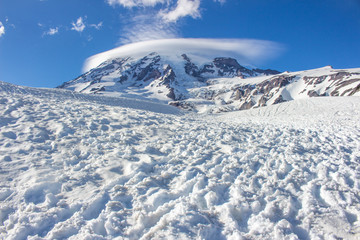 Fototapeta premium Snowing mountain with cloud and blue sky