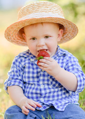 portrait of a little boy in nature