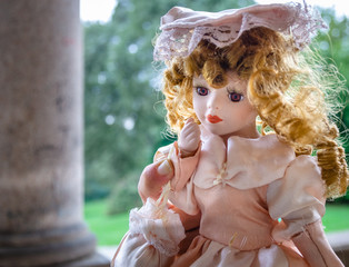 old dama doll at the park