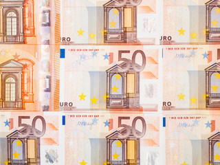 Close up top view of fifty euro banknotes bills. European currency
