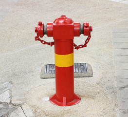 red fire hydrant with chain