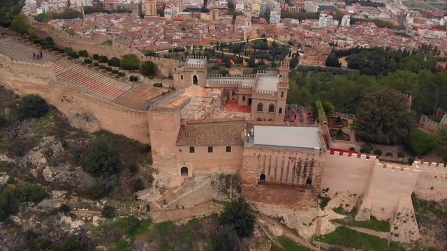 Aerial view of the Castle of Xativa, with cloudy sky.