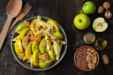 Apple salad with seeds and spices. Vegan lunch idea.
