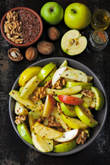 Apple salad with seeds and spices. Vegan lunch idea.
