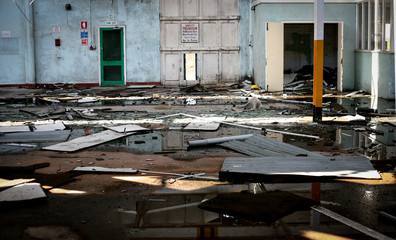 office retail derelict water reflecting from floor