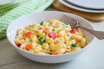 Macaroni salad with elbow pasta and vegetables in bowl