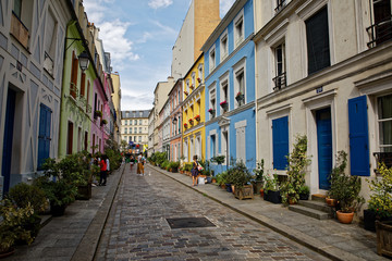 Fototapeta na wymiar Rue Crémieux, Paris, France - July 5, 2018: Rue Cremieux in the 12th Arrondissement is one of the prettiest residential streets in Paris.