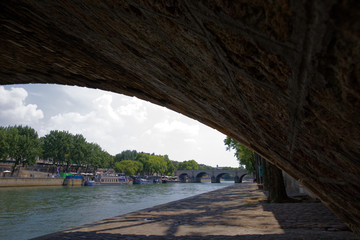 Paris, France - July 7, 2018: River seine with bridge in Paris