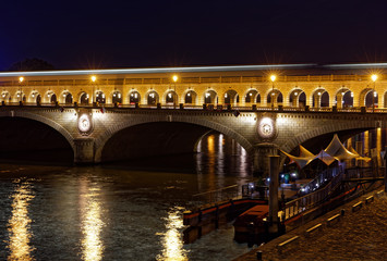 Fototapeta na wymiar Paris, France - October 31, 2017: Bercy bridge viewed from river Seine