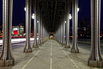 Obraz premium Paris, France - February 17, 2018: Bir-Hakeim bridge in Paris with bicycle road