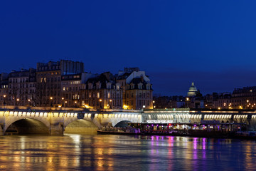 Obraz na płótnie Canvas Paris, France - February 18, 2018: View of Pont Neuf, old bridge in Paris by night