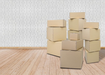 Moving in new home. Empty room with Carton boxes