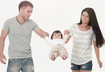 lovely parents play with their son together indoors