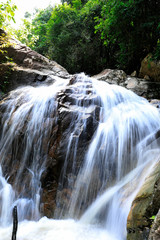 Fototapeta na wymiar tan rua waterfall at koh samui,surat thani province Thailand