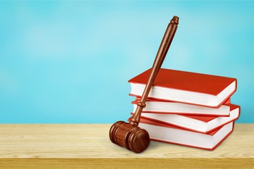 Justice Scales and books and wooden gavel