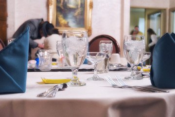 elegant table setting with crystal stemware