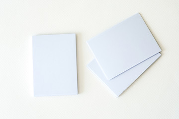 stacking of mockup empty white business card  on a white paper background , a template for business  branding identity design