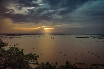 Fototapeta premium golden sunset with reflections on the lake