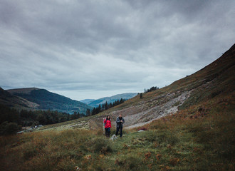Fototapeta premium Couple trekking in Glen Etive, Scotland