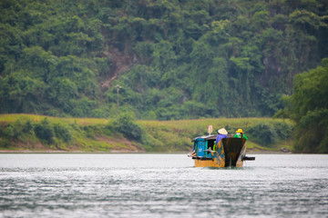 A boat on river to Phong Nha Cave