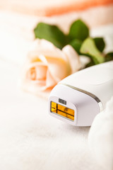 Modern photoepilator with bath accessories