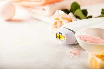 Modern photoepilator with bath accessories