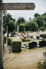 Wooden sign at a graveyard