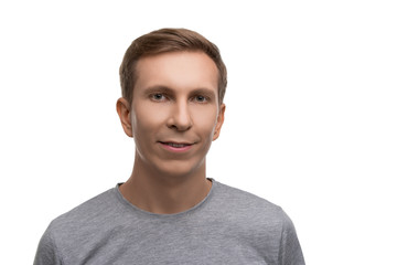 Fair male in gray t-shirt isolated portrait