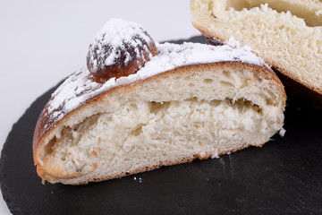 Rizzuola or iris with baked ricotta