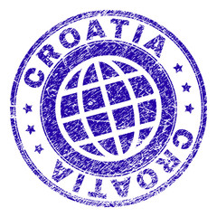 CROATIA stamp print with grunge texture. Blue vector rubber seal imprint of CROATIA caption with corroded texture. Seal has words arranged by circle and globe symbol.