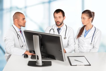 Doctors team talking expertise  on background